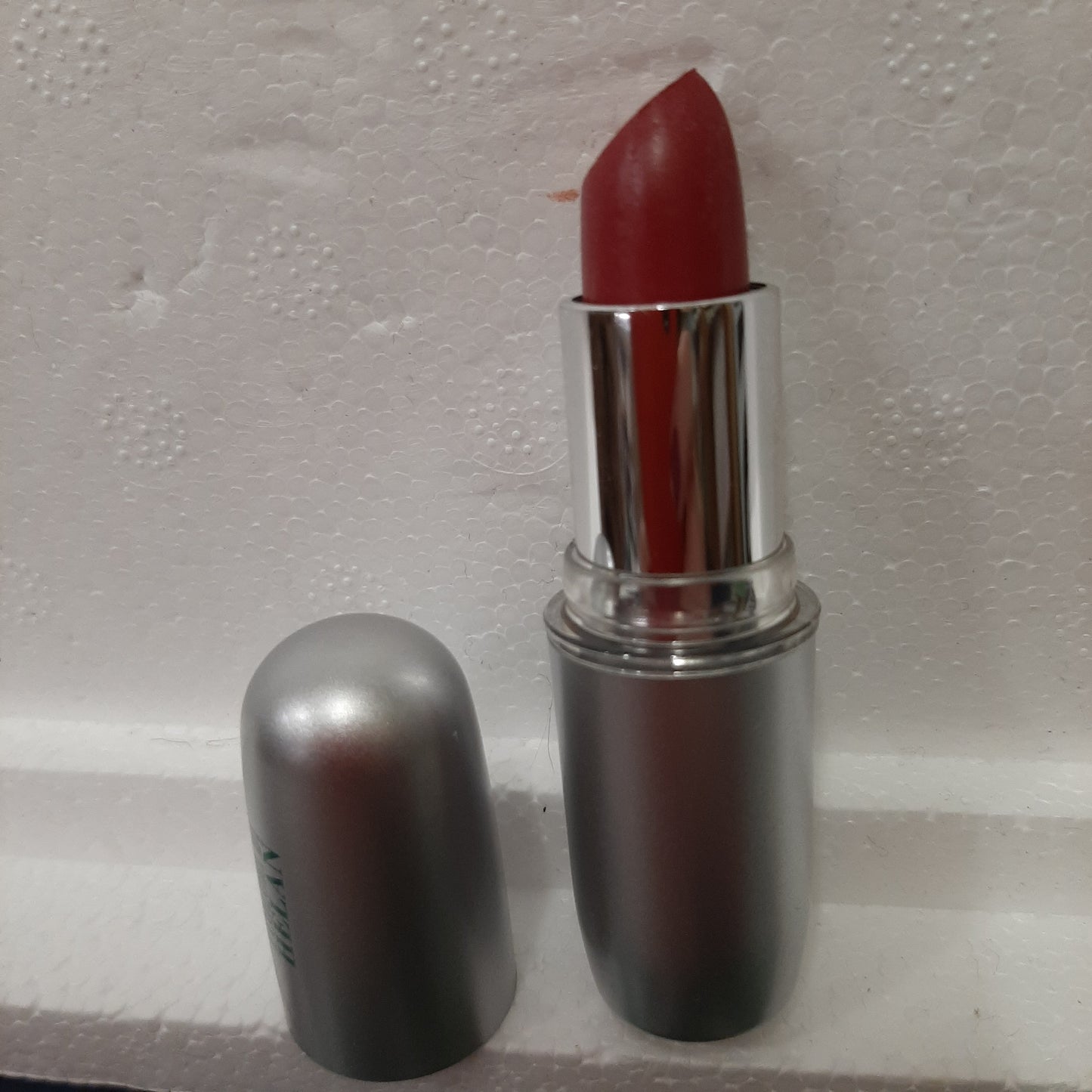 Helan bright aubergine lipstick